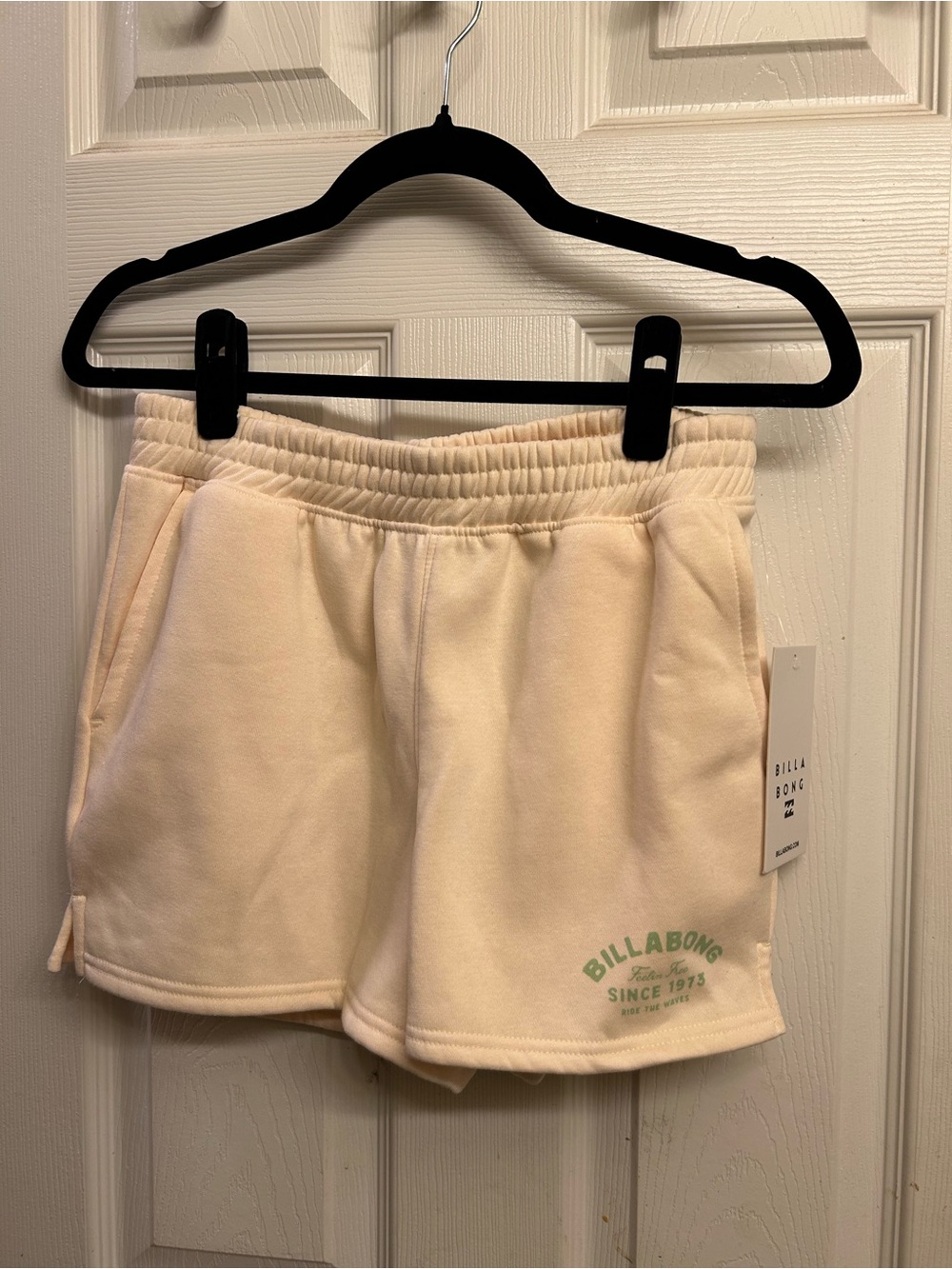 Billabong Cream Athletic Shorts with Green Logo
